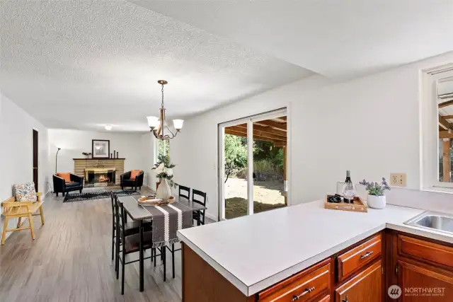 Kitchen, Dining Room and Family Room all flow seamlessly together - ideal for entertaining!