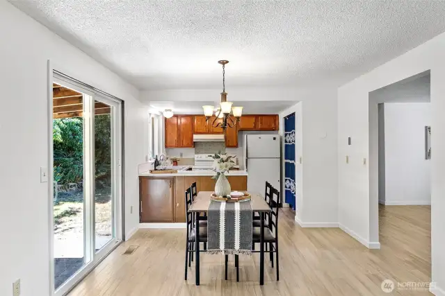 Dining Room with slider to the backyard and covered porch.