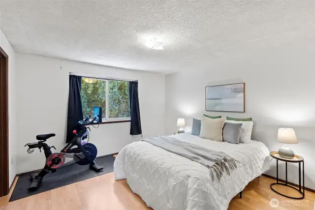 Spacious Primary with a window looking to the backyard!