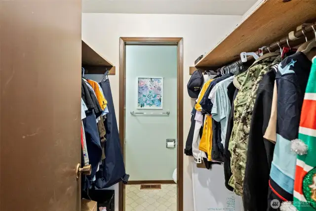Walk-in Closet with half bath from Primary.