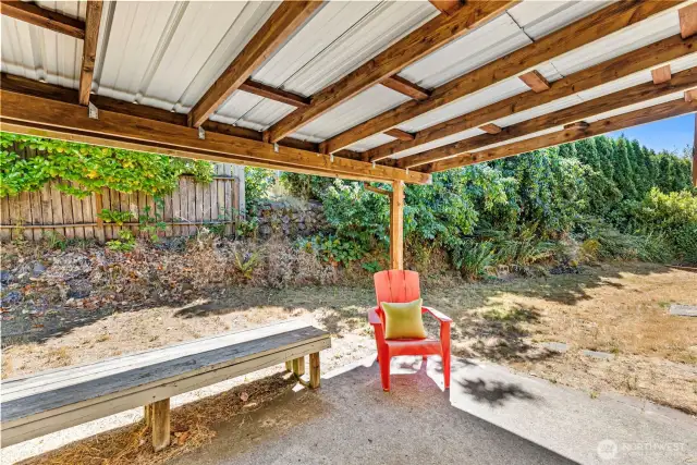 Covered back porch to relax and enjoy all seasons!