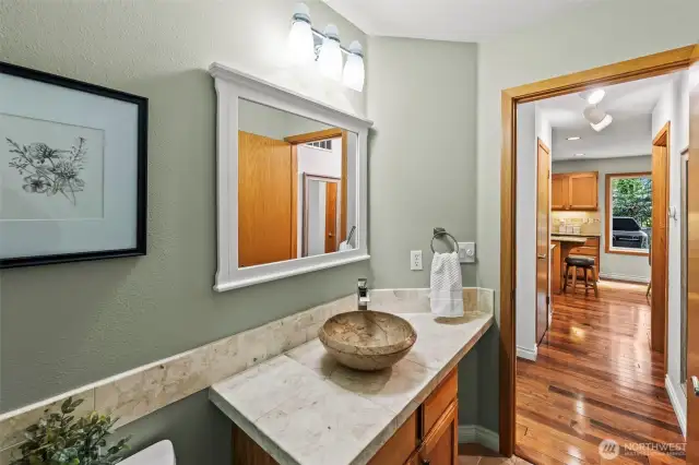 Main Floor Half Bathroom - gorgeous tile and vessel sink!