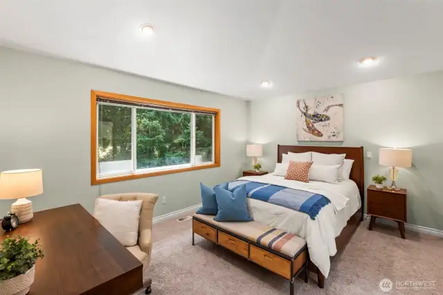 Elegant Primary bedroom with amazing vaulted ceilings!