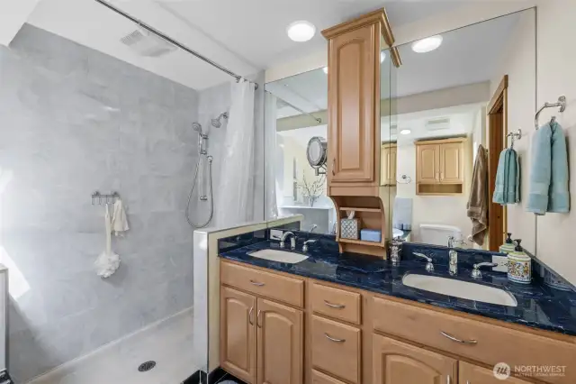 New tile shower and bath surrounds! Dual sink vanity.