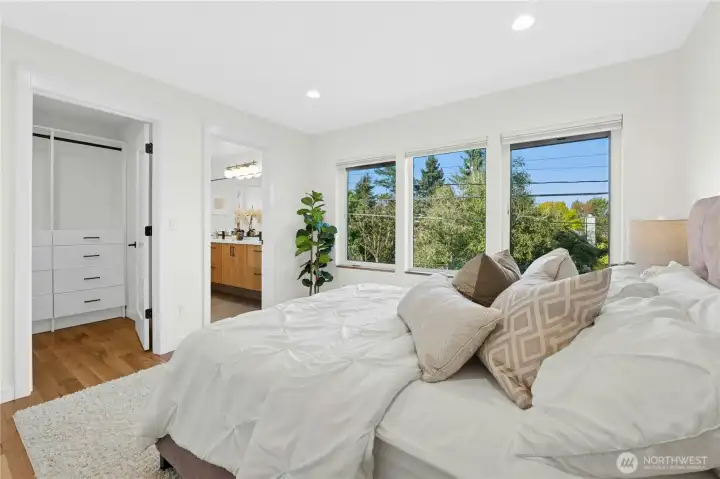 Walk-in closet keeps your space tidy and has plenty of room for your storage needs.