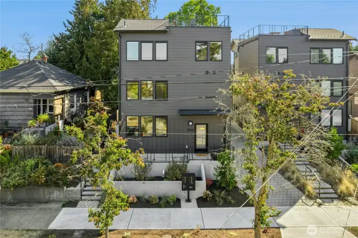 Mailbox location is easy to access - right in front of your home. Driveway to your dedicated parking spot is shown between buildings.