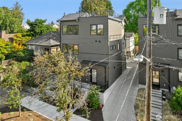 Dedicated parking spot is just behind your home, with access to your front door via private path on north side of building.
