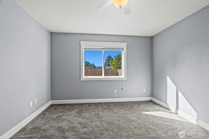 Primary Bedroom with ceiling fan