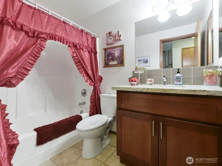 Full bath w/ shower on Main Floor. Granite countertops.