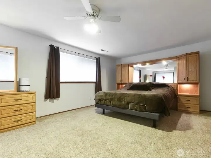 Primary Bedroom like new carpets. Fan/light. Attached primary spacious closet.