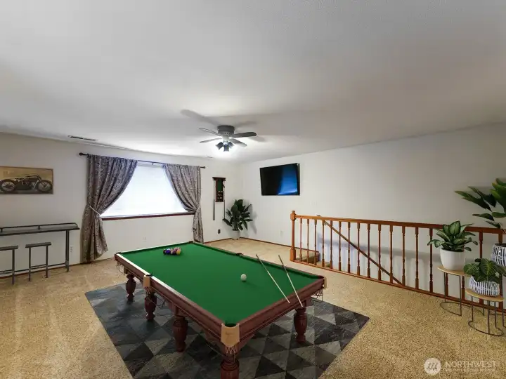 Staged upstairs bedroom or Recreation room.