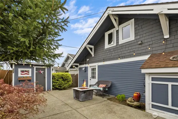View of back of the home, all new siding, windows and door, private and serene back here too!