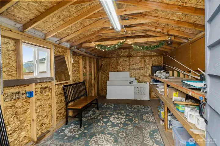 Inside of large shed with power already installed.