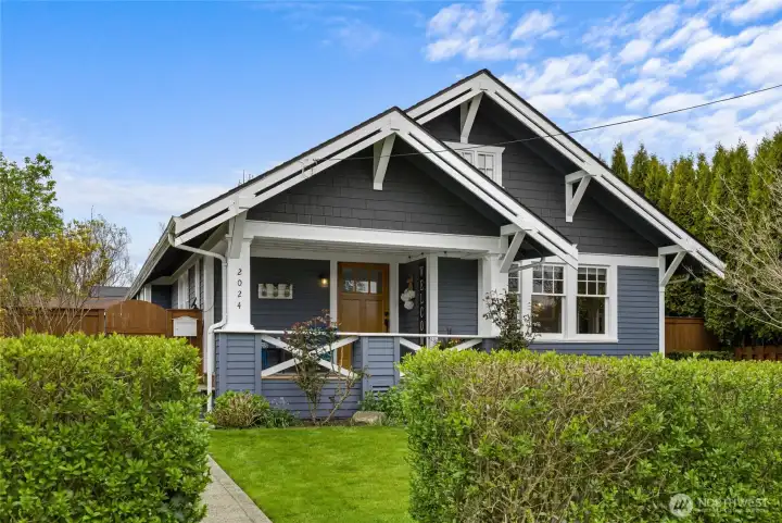 Your new home and all of its custom touches. Front yard hedges and mature landscaping.