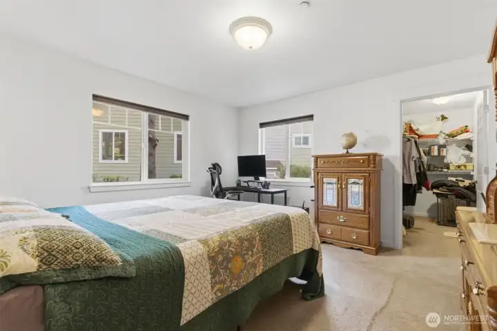 This is the downstairs second bedroom with large walk-in closet.