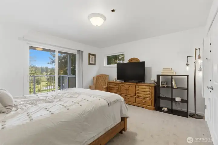 Third bedroom upstairs with golf course views