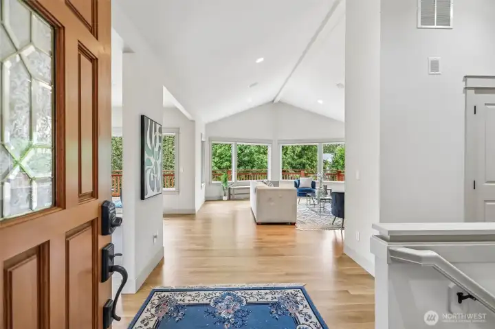 Welcome inside to an open concept great room featuring brand new floors, new paint, tall cileings with tons of windows for natural light!