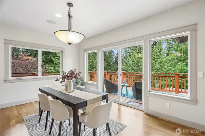 Great Large dining room with doors leading to your covered patio for year round entertaining.