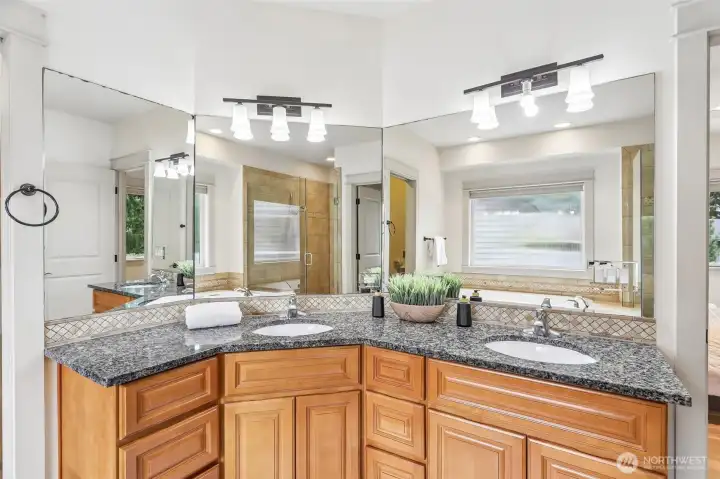 Deluxe Master Bathroom with dual sinks tons of storage, nice soaking tiled tub and shower! Separate water closet with door.