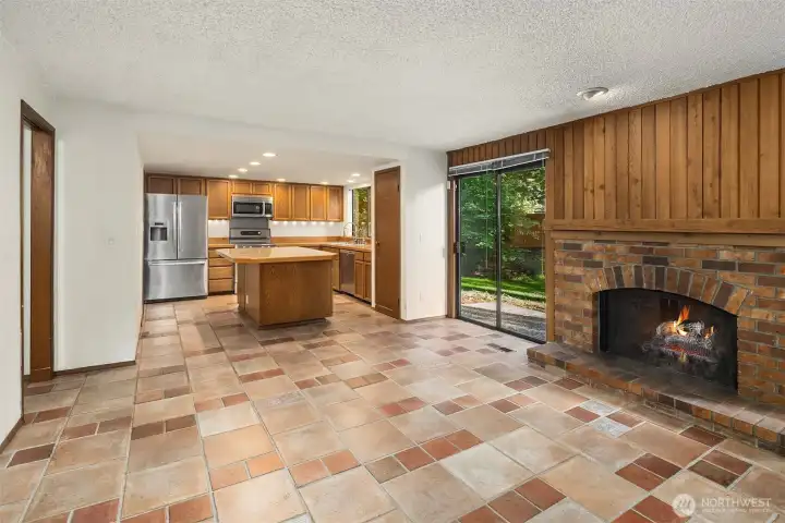 Living room has access to the fully fenced backyard.