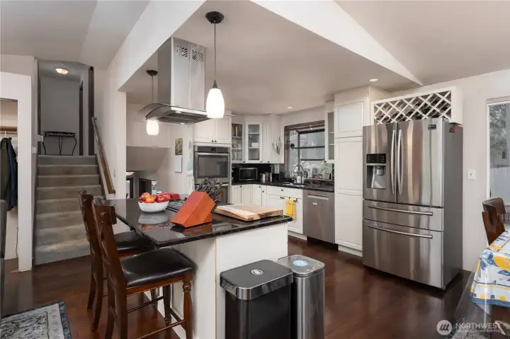 Updated kitchen! All appliances stay. Stairs to upper and lower levels.
