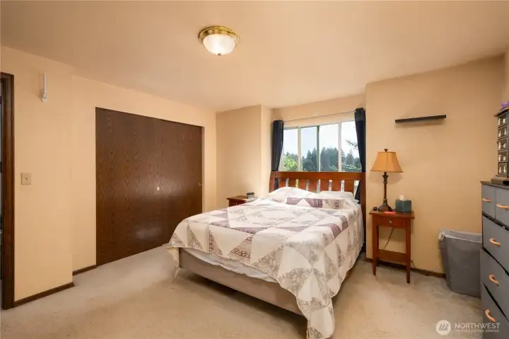Another view of primary bedroom