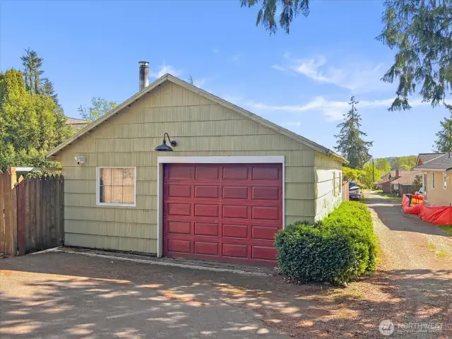 Detached garage with alley access.