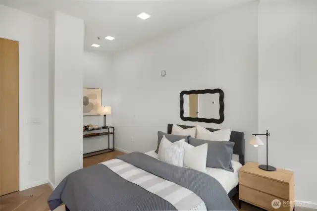 Large nook that may be utilized as an office space or closet.