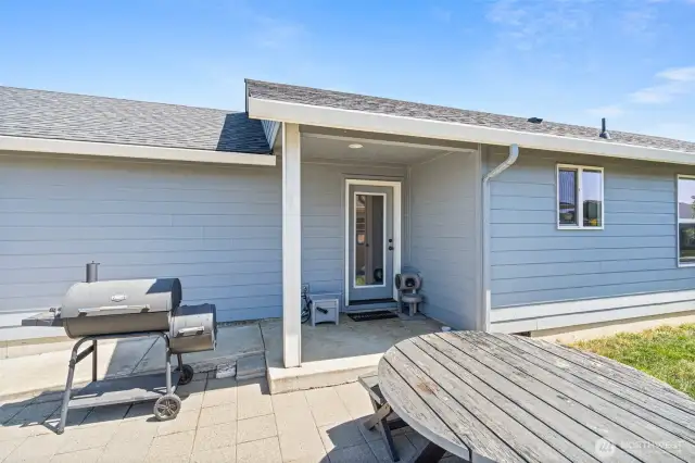 Rear entrance through covered patio