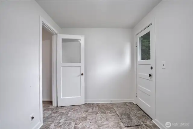 Utility room. Back door to the right.