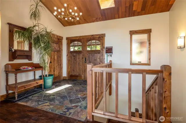 Deluxe entry foyer  open and vaulted