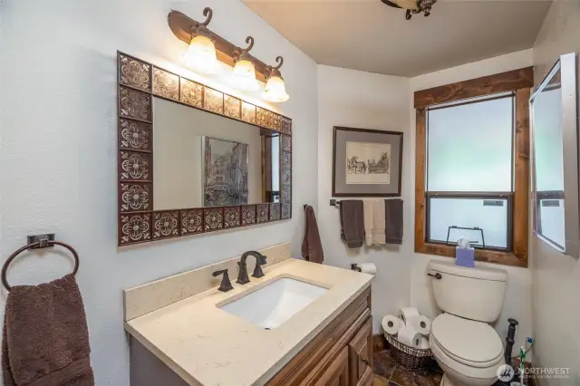 1/2 bath upgraded on main floor.