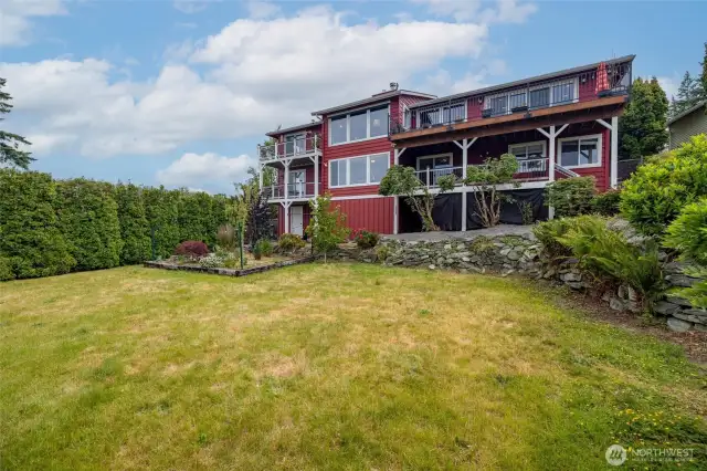Backyard and exterior of the back of the home.