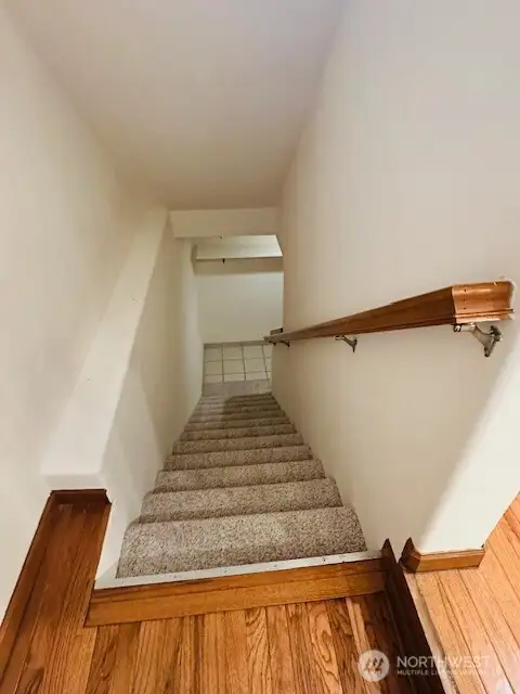 The stairs to the garage and storage area.