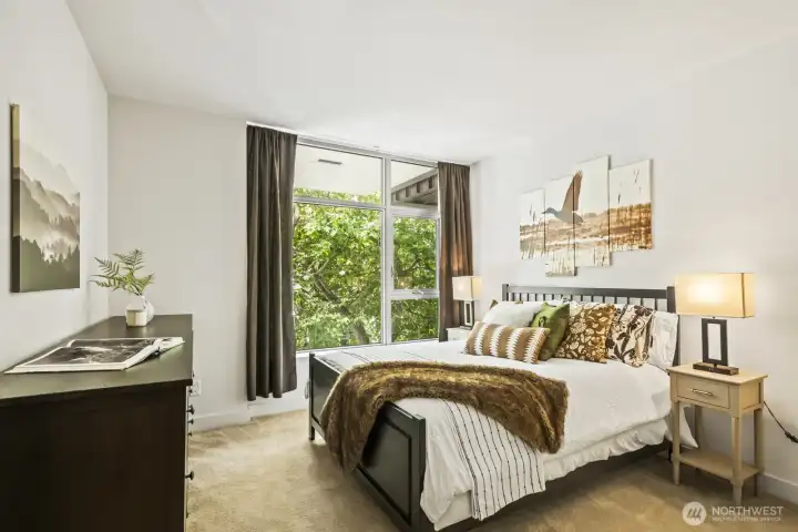 Enjoy city views from the oversized bedroom with walk-in-closet.