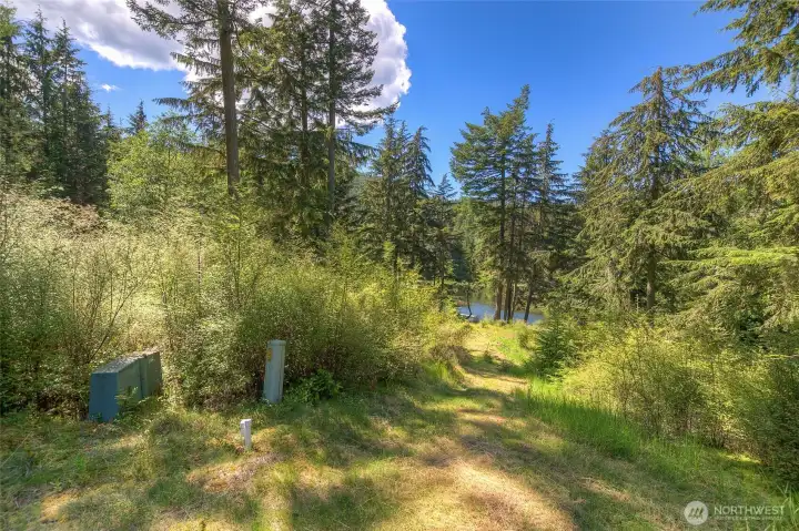 Utilities for Lot 5 are on the left in close proximity to the building site.