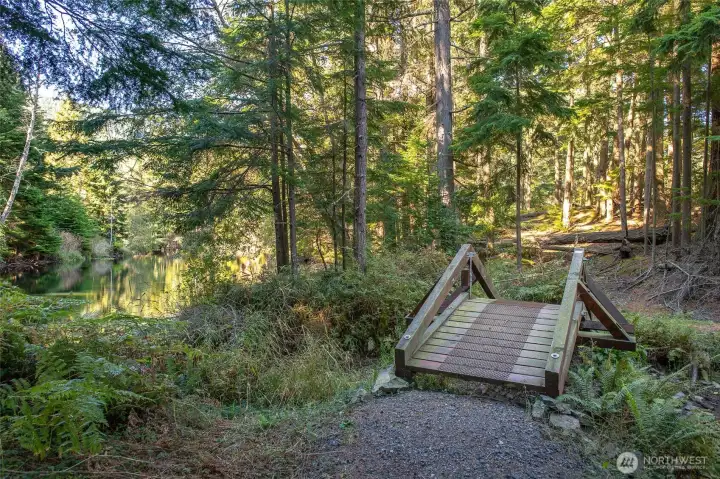 Cross this picturesque footbridge to Girls' Island on Eagle Lake and enjoy peaceful forest trails, calm waters, and the beauty of the Pacific Northwest at its finest.