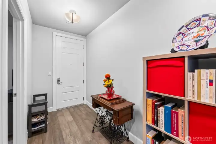 Entry hall. The 2nd bedroom door is to the left of this photo