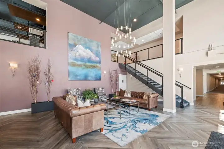 Welcome to the Baker Condominiums! The lobby includes a semi-private room for gathering on the same level or go upstairs to the community room.  It is reservable and your deposit is refundable if you leave the space the same way you found it. Great for big parties.