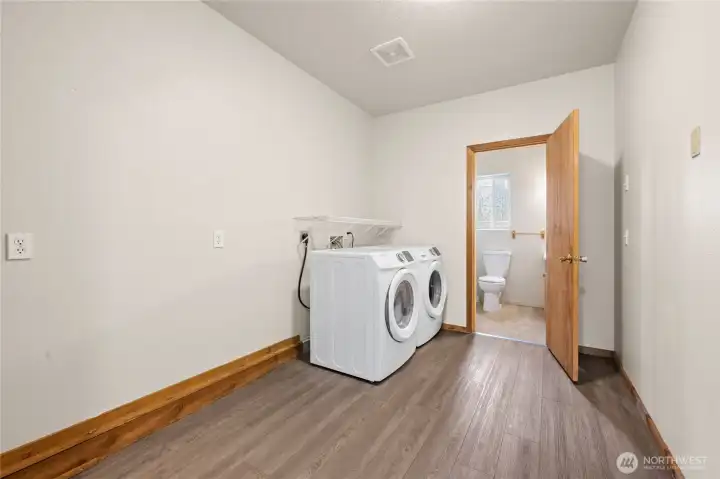 Utility room with 3/4 bath