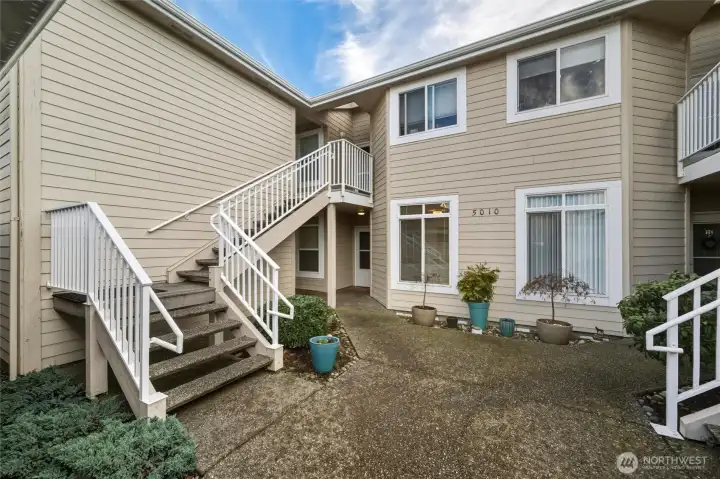 This is a ground floor unit with a single car garage, and no stairs.
