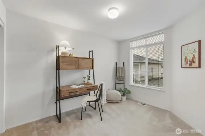 The 2nd bedroom gets a lot of natural sunlight and would make a good office or studio.