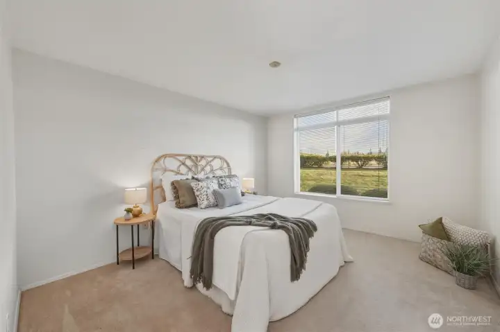 The primary bedroom is also south-facing and spacious.