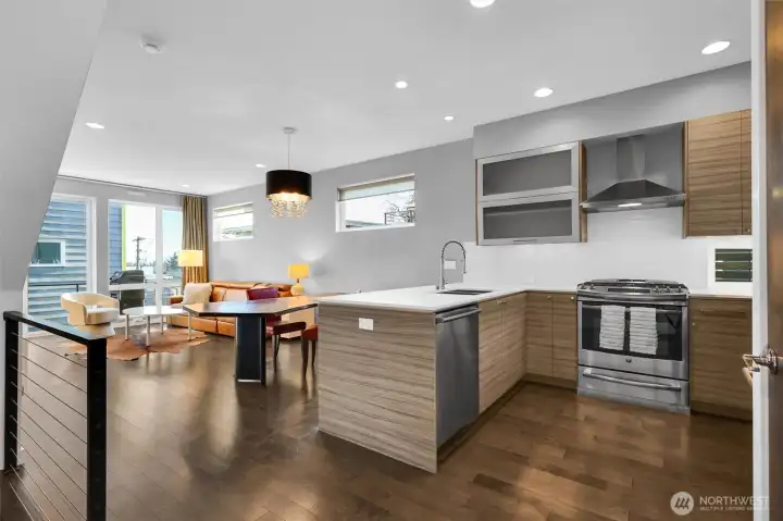 Wine on the deck watching the setting sun light up the houses across the lake in streaks of orange and pink  Watching the snow on the Cascades gather through the winter then melt through the spring.