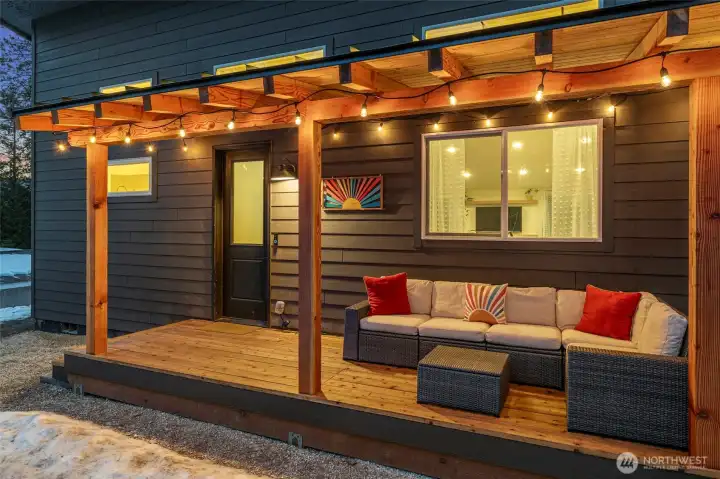 Completed in 2025, the cedar post-and-beam covered front porch features a tongue-and-groove ceiling and metal roof—perfect for taking in the mountain air year-round.