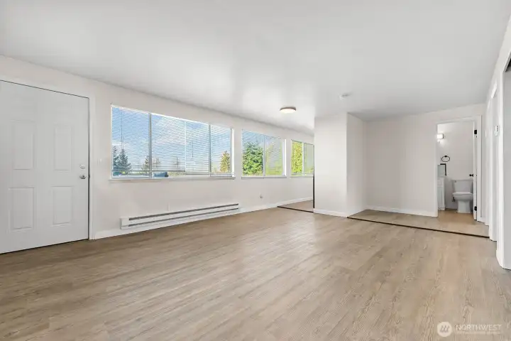 Unit 2 - 2 beds, 1 bath. Newer LVP flooring, paint, light fixtures, and appliances.