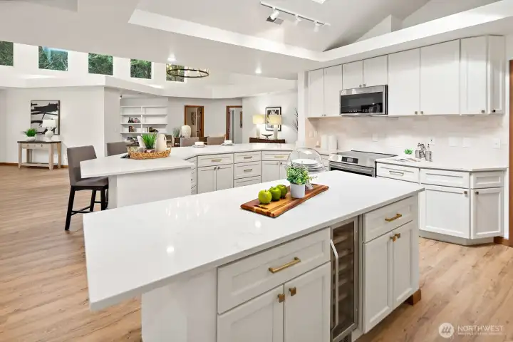 Storage galore and plenty of prep space throughout the large light kitchen!