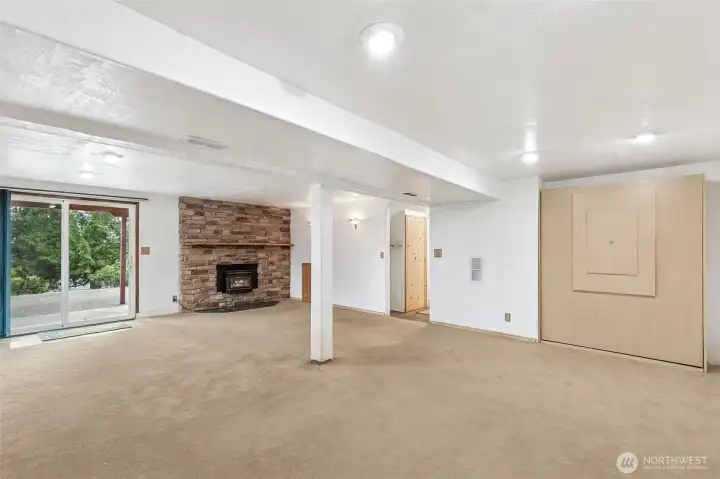 Finished walk-out basement with office nook, recreation room, and a built-in Murphy bed with drop-down  sleeping space.