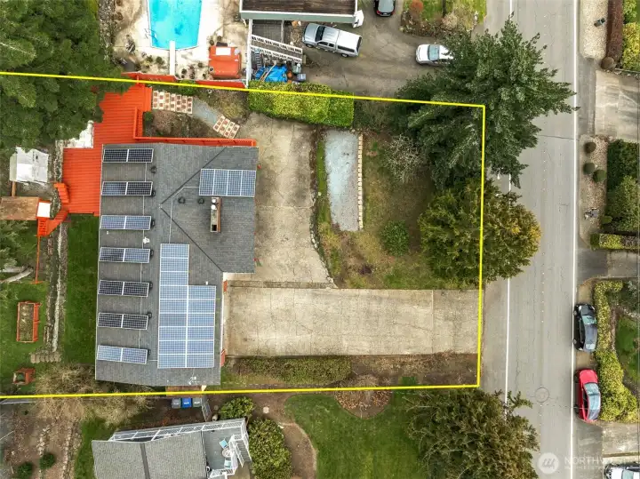 Energy-efficient home featuring 33 solar panels and double windows.