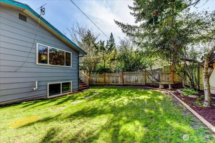 Fully fenced back and side yard to corral your furry friends!